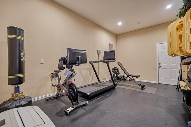 Discover the expansive home gym, perfect for all your fitness needs. | Image 27