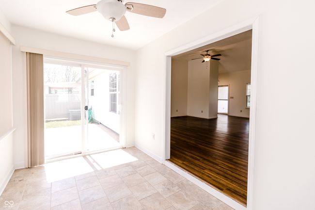 spare room featuring baseboards and ceiling fan | Image 27