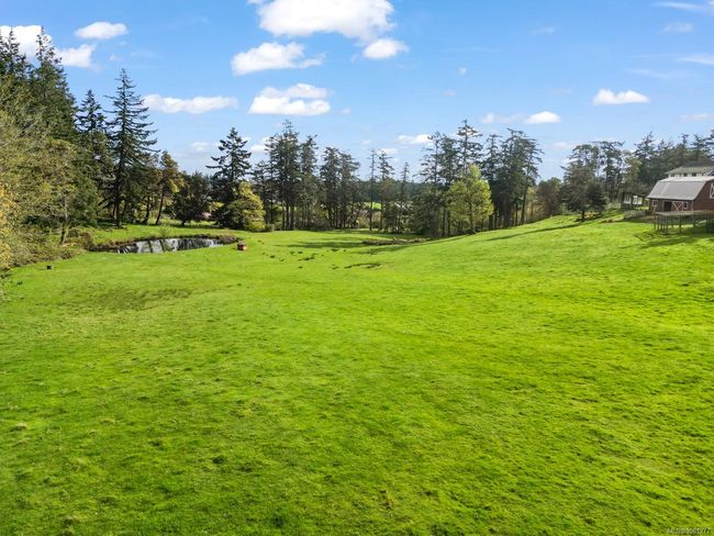View of green lawn featuring a water view | Image 57