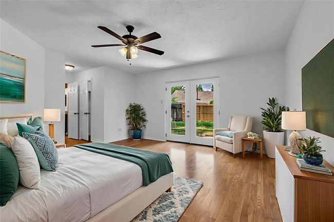 Huge primary bedroom with new French door. Virtually staged. | Image 22