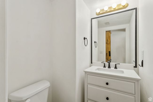 Half bath with toilet and vanity | Image 10