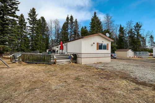 33122 Range Road 50, Home with 4 bedrooms, 2 bathrooms and null parking in Sundre AB | Card Image