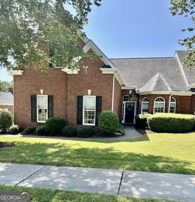 5485 Villa Lake Court, Townhouse with 3 bedrooms, 3 bathrooms and null parking in Suwanee GA | Image 1