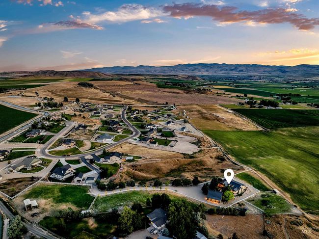 Aerial view of property's location featuring mountains | Image 49