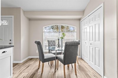 Eat in kitchen with spacious laundry area and pantry. | Image 3