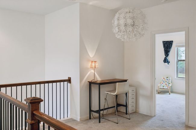 Hall with baseboards, light carpet, and an upstairs landing | Image 19