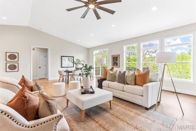 Spacious great room with transom windows and a beautiful view! | Image 17