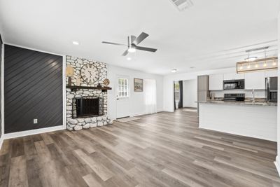 Family Room has fireplace for cozy winter evenings | Image 3