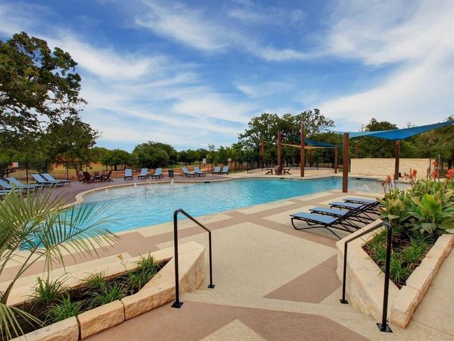 Community pool featuring a patio | Image 38