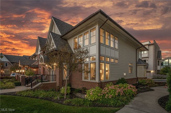 Front-corner twilight perspective showcasing the townhome | Image 39