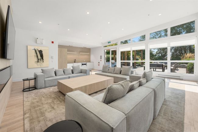 Living room with baseboards, light wood-type flooring, and recessed lighting | Image 28