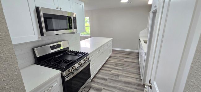 New GE stainless appliance including with this home. | Image 4