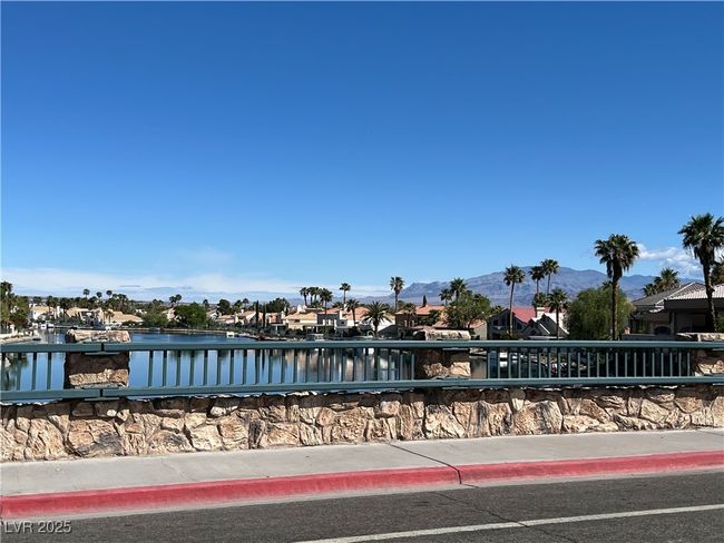 View of pool featuring a water and mountain view and a residential view | Image 22