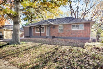 Ranch-style home with central air condition unit | Image 2