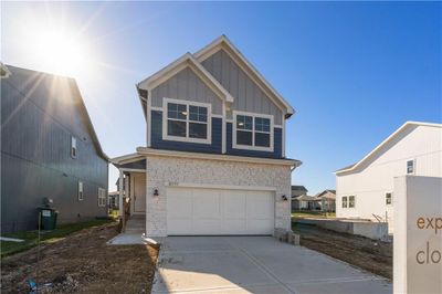 View of front of home with a garage | Image 1