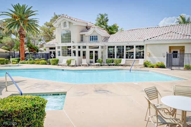 Community pool featuring a patio | Image 24