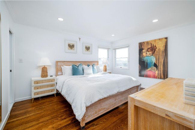 Bedroom with dark wood-style floors, recessed lighting, baseboards, and ornamental molding | Image 15