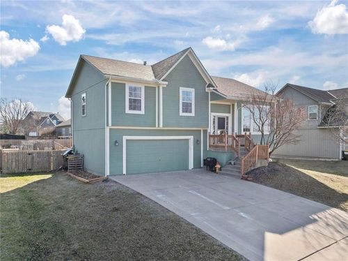 1303 N 3rd St E, Louisburg, KS, 66053-6453 | Card Image