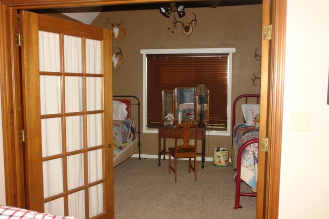 View of carpeted bedroom | Image 5