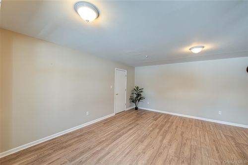 27-27 El Camino Ct, Coram, NY, 11727-1505 | Card Image