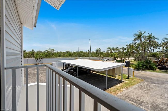 View of carport. Very close walk to unit | Image 25