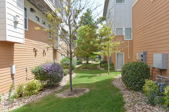 Just outside garage; HOA maintains; not fenced | Image 22