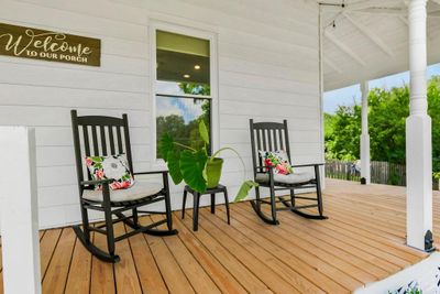 Beautiful front porch ready for a tall glass of iced tea. | Image 3