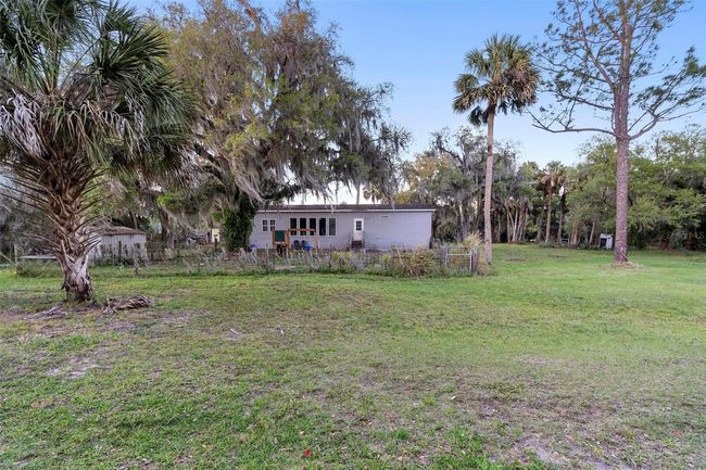 Fenced in area in the backyard | Image 30