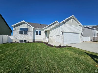 View of front of property with a front lawn and a garage | Image 3