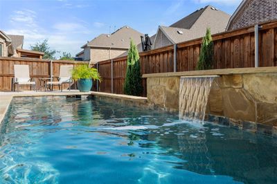 Back yard features cocktail pool | Image 2