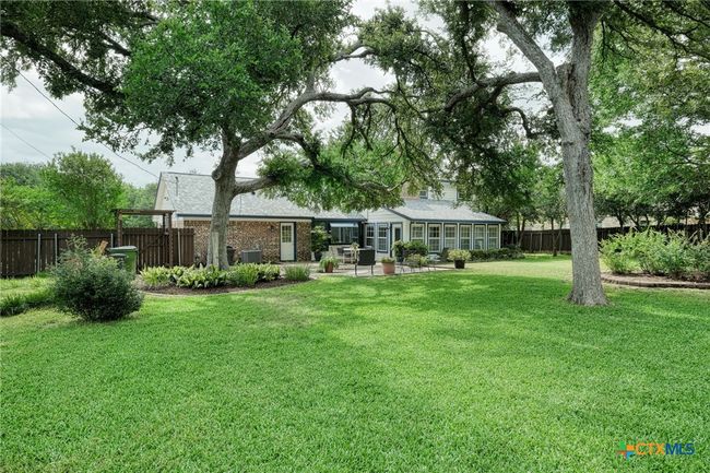 WOW! Such a peaceful and beautiful backyard. Plenty of room for a pool! | Image 30