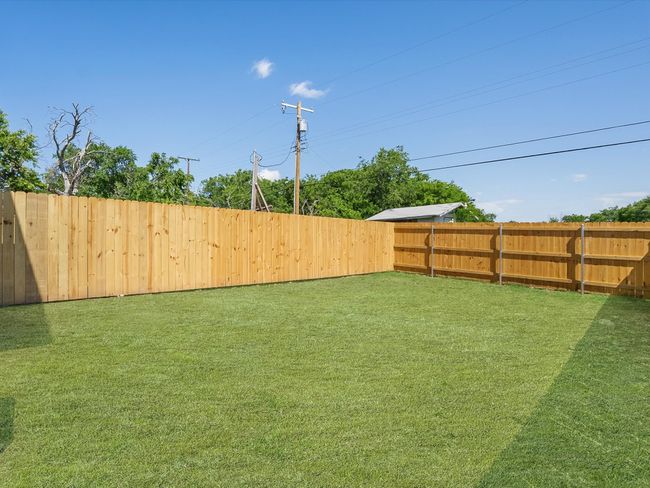 View of yard with a fenced backyard | Image 24