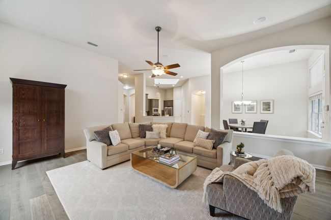 The open-concept design allows for effortless movement between the living, kitchen, and dining areas—ideal for relaxed living and hosting guests. | Image 10