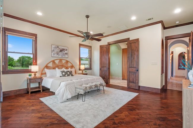 Alternative view of primary suite showing ensuite entrance. | Image 19