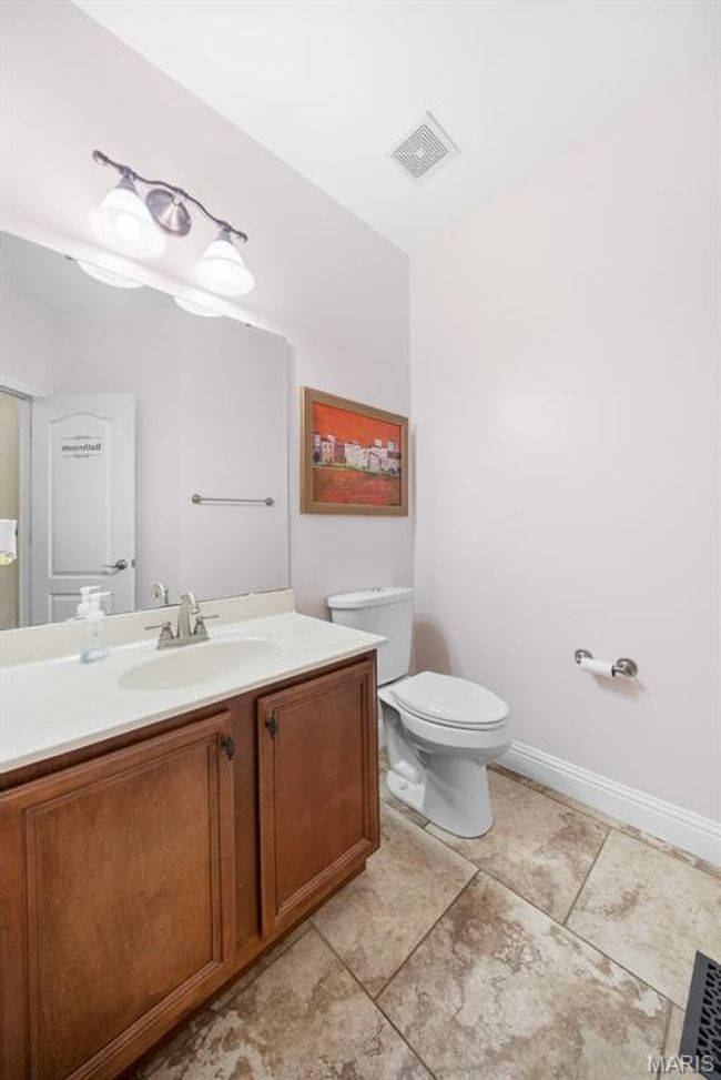 Powder Room (1 of 2)-- just off the Kitchen/Garage. | Image 18