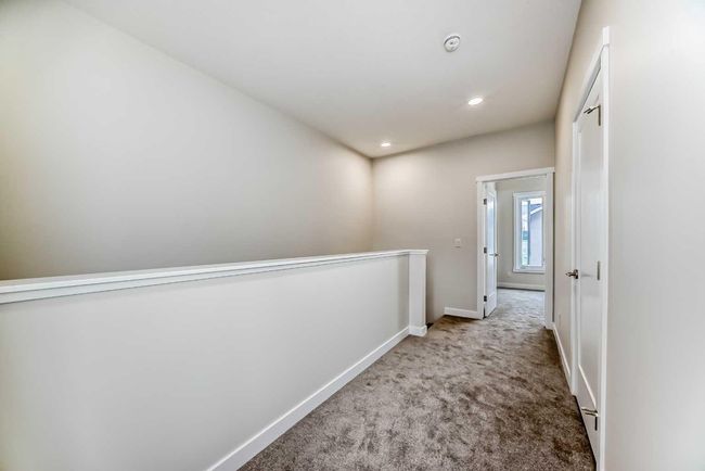 214 Shawnee Square Sw, Townhouse with 2 bedrooms, 3 bathrooms and 3 parking in Calgary AB | Image 23