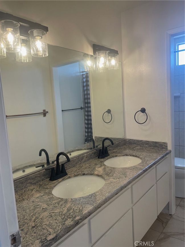 Bathroom view of double sink | Image 10