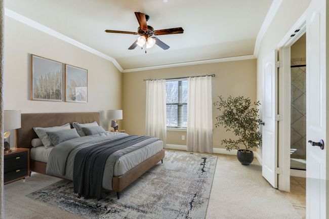 Bedroom featuring carpet, crown molding, and ceiling fan | Image 23