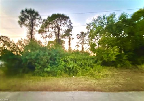 524 Harry Thayer Ave S, Lehigh Acres, FL, 33974-9676 | Card Image