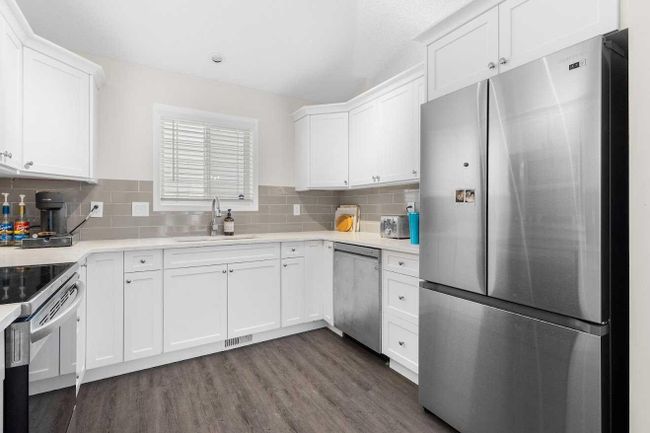 32 Arbour Crest Dr Nw, House detached with 3 bedrooms, 3 bathrooms and 2 parking in Calgary AB | Image 6