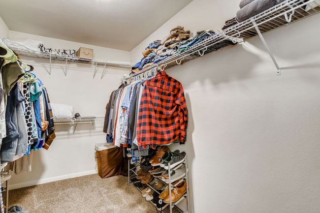 Spacious closet with carpet | Image 19