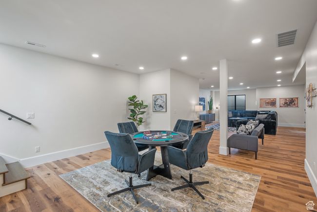 Dining room featuring light wood finished floors and recessed lighting | Image 52