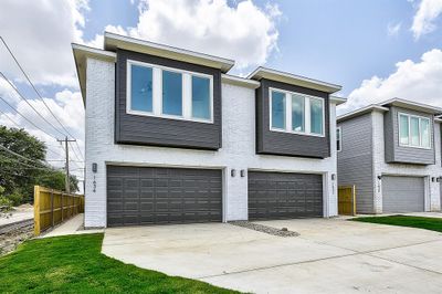 Modern home with a garage | Image 3