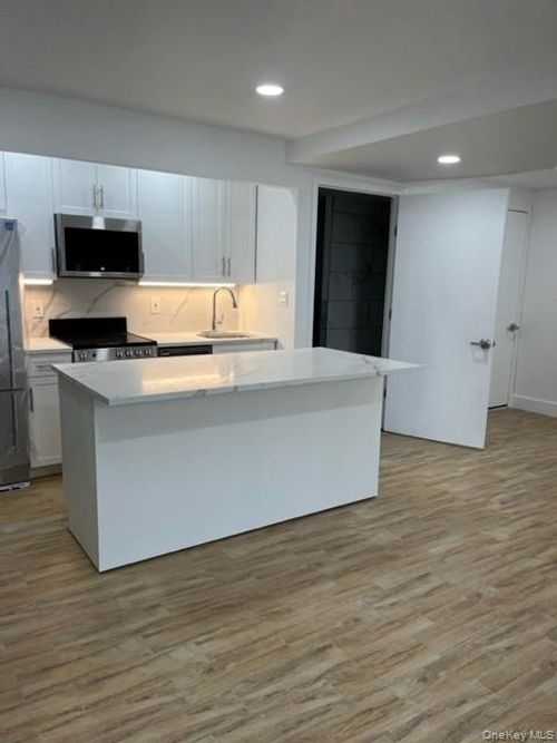 1a-6334 Fresh Pond Rd, Ridgewood, NY, 11385-2663 | Card Image