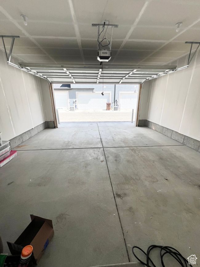 Garage featuring a garage door opener | Image 18