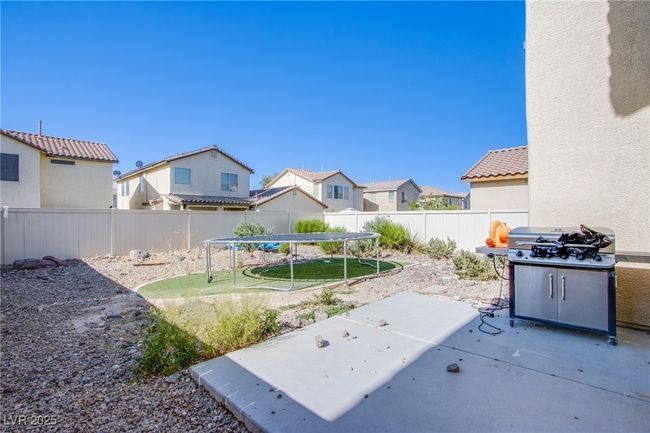 Fenced backyard featuring a patio and a residential view | Image 20