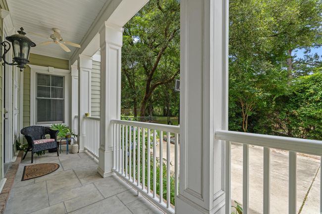 Porch featuring a ceiling fan | Image 7