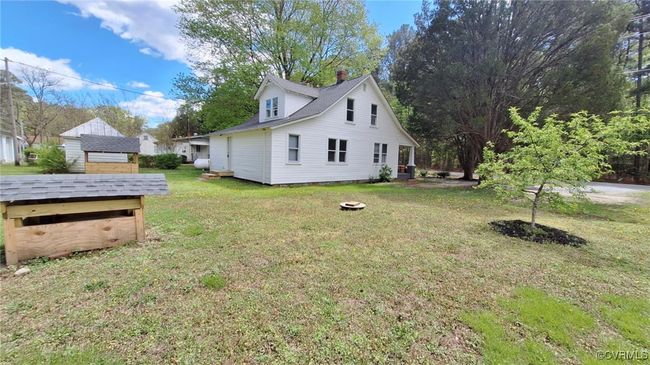 View of side of property with a lawn | Image 42