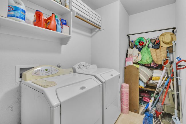 Laundry room with washer and clothes dryer | Image 25