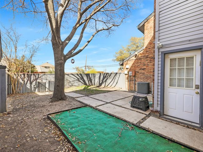 View of yard featuring central AC unit, a patio, and a fenced backyard | Image 30